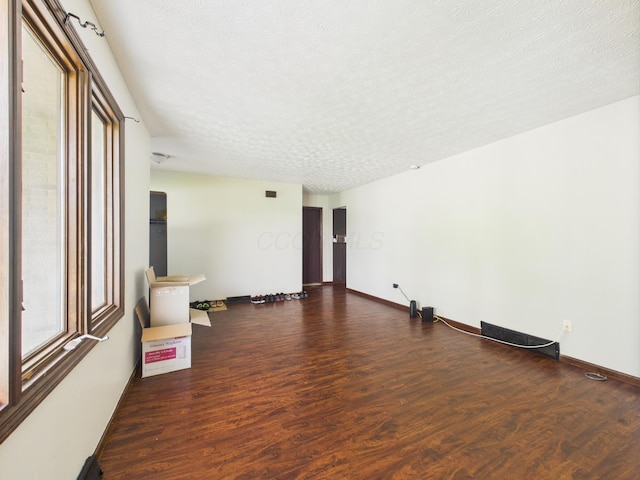 6343 Birchview Dr S Unit 6343-6345, Reynoldsburg, OH 43068 - empty room featuring wood finished floors and a textured ceiling