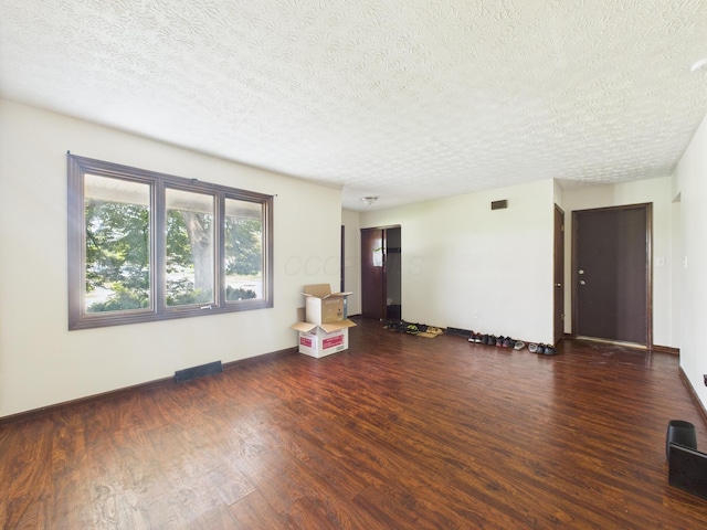 6343 Birchview Dr S Unit 6343-6345, Reynoldsburg, OH 43068 - empty room with a textured ceiling and wood finished floors