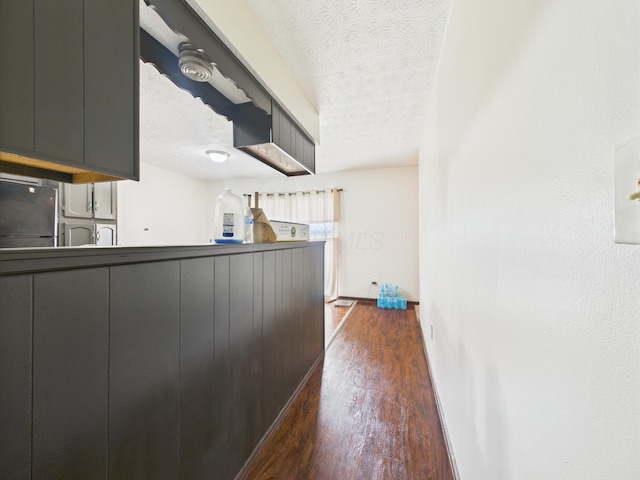 6343 Birchview Dr S Unit 6343-6345, Reynoldsburg, OH 43068 - hallway with dark wood finished floors, a textured ceiling, and washer / clothes dryer