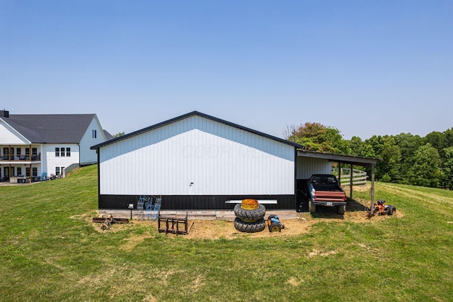 1526 Crosley Rd, Granville, OH 43023 - view of home's exterior featuring a yard, an outbuilding, and a carport