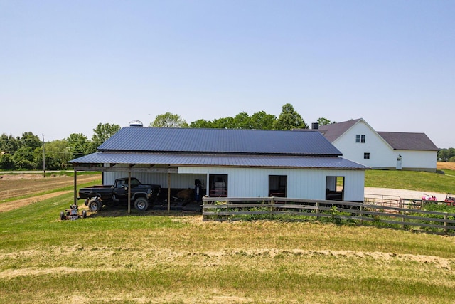 1526 Crosley Rd, Granville, OH 43023 - rear view of property featuring a metal roof and an outbuilding