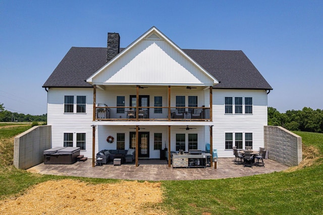 1526 Crosley Rd, Granville, OH 43023 - rear view of house with ceiling fan, a hot tub, outdoor lounge area, a balcony, and a patio