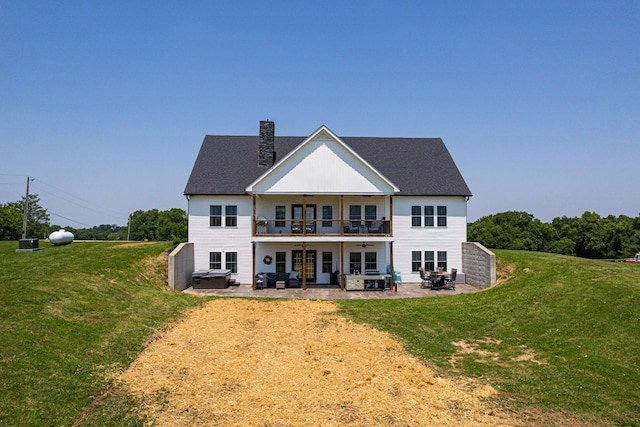 1526 Crosley Rd, Granville, OH 43023 - back of house with a ceiling fan, a patio, a yard, and an outdoor hangout area