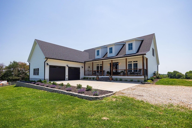 1526 Crosley Rd, Granville, OH 43023 - modern farmhouse style home with covered porch, a garage, driveway, a front lawn, and a shingled roof