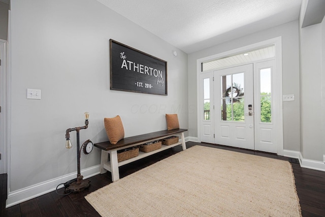 1526 Crosley Rd, Granville, OH 43023 - foyer with dark wood-style floors and a textured ceiling