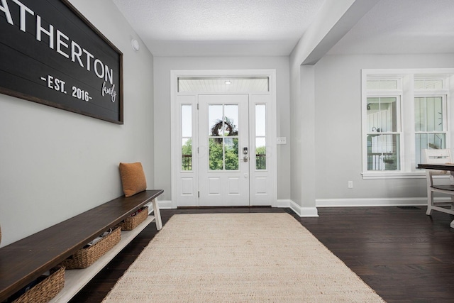 1526 Crosley Rd, Granville, OH 43023 - foyer with plenty of natural light, dark wood-style floors, and a textured ceiling