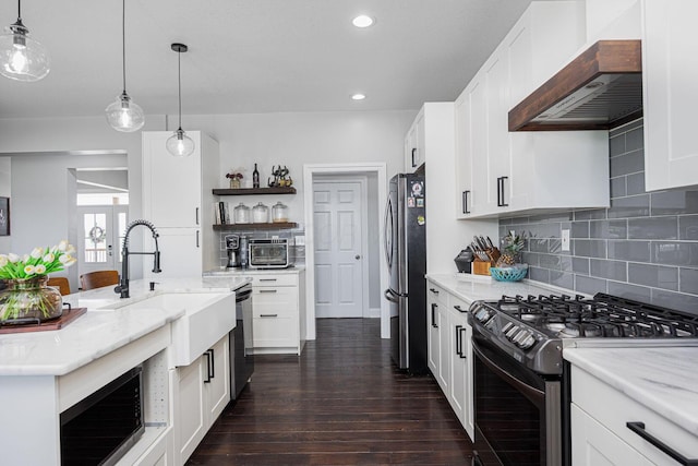 1526 Crosley Rd, Granville, OH 43023 - kitchen with appliances with stainless steel finishes, wall chimney exhaust hood, open shelves, dark wood-style floors, and backsplash