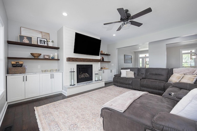 1526 Crosley Rd, Granville, OH 43023 - living room featuring recessed lighting, dark wood-type flooring, a large fireplace, and a ceiling fan