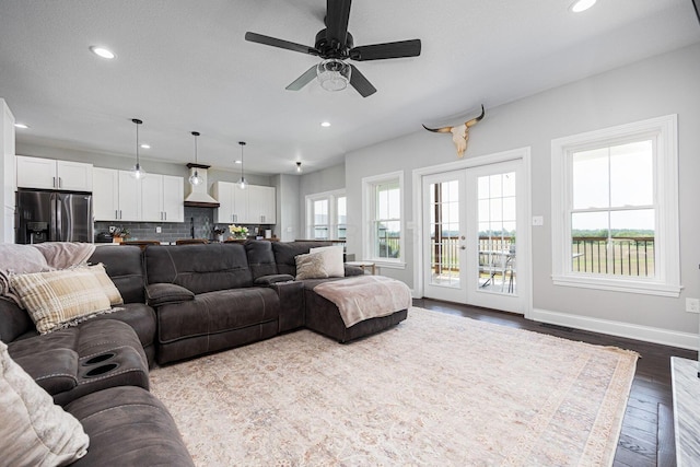 1526 Crosley Rd, Granville, OH 43023 - living area with dark wood finished floors, recessed lighting, a ceiling fan, and french doors