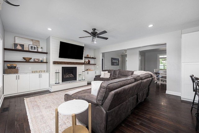 1526 Crosley Rd, Granville, OH 43023 - living room with dark wood-style floors, ceiling fan, recessed lighting, and a large fireplace