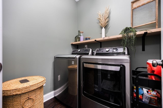 1526 Crosley Rd, Granville, OH 43023 - washroom with washer and clothes dryer and dark wood-style flooring