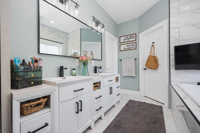 1526 Crosley Rd, Granville, OH 43023 - bathroom with marble finish floors, vanity, and a bathtub