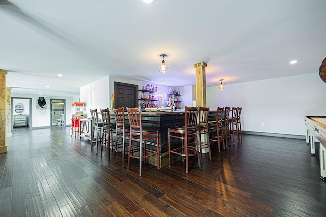 1526 Crosley Rd, Granville, OH 43023 - indoor dry bar with ornate columns, wood finished floors, and recessed lighting