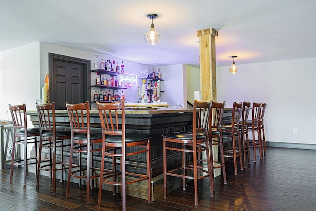 1526 Crosley Rd, Granville, OH 43023 - indoor dry bar with hardwood / wood-style floors and decorative light fixtures