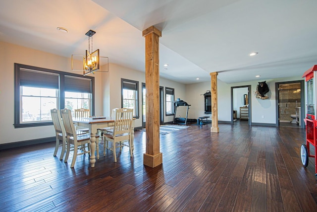 1526 Crosley Rd, Granville, OH 43023 - dining space with ornate columns, wood finished floors, a chandelier, and recessed lighting
