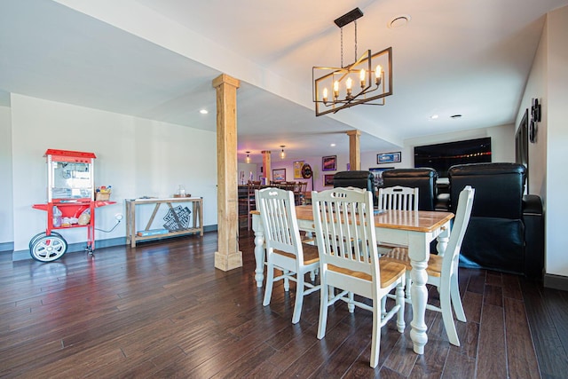 1526 Crosley Rd, Granville, OH 43023 - dining room featuring decorative columns, wood finished floors, a chandelier, and recessed lighting