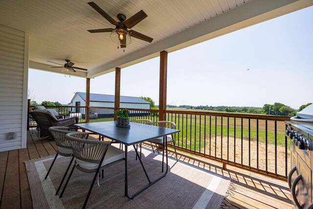 1526 Crosley Rd, Granville, OH 43023 - wooden deck with a ceiling fan and outdoor dining area
