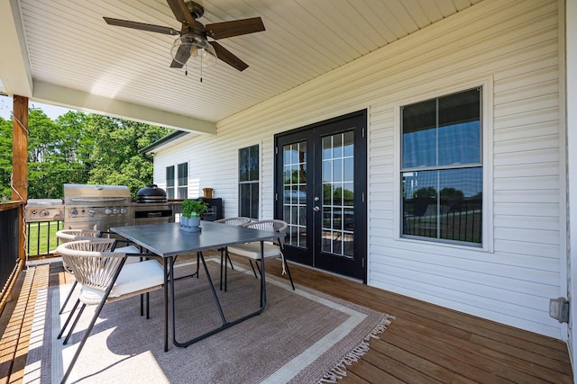 1526 Crosley Rd, Granville, OH 43023 - wooden deck with french doors, outdoor dining area, ceiling fan, and area for grilling