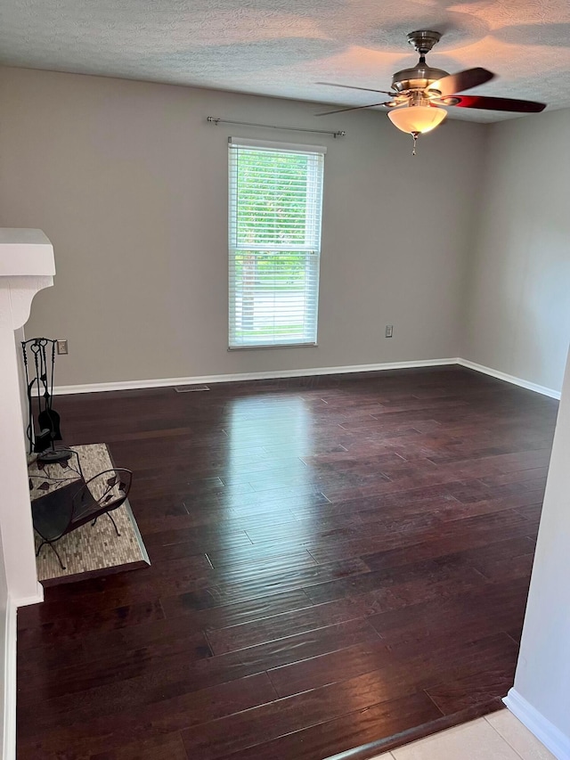 347 W 5th Ave, Columbus, OH 43201 - empty room featuring hardwood / wood-style flooring, ceiling fan, and a textured ceiling