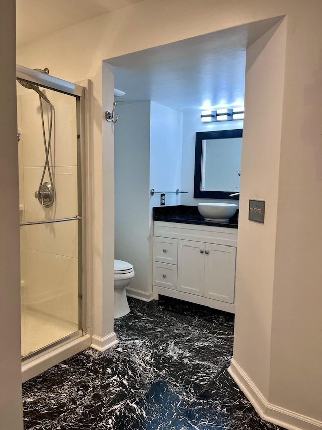 347 W 5th Ave, Columbus, OH 43201 - full bathroom featuring marble finish flooring, a stall shower, and vanity