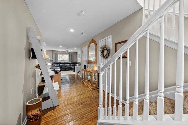 8438 Diversey Loop Unit 504, Blacklick, OH 43004 - entrance foyer with stairway, wood finished floors, recessed lighting, and a ceiling fan