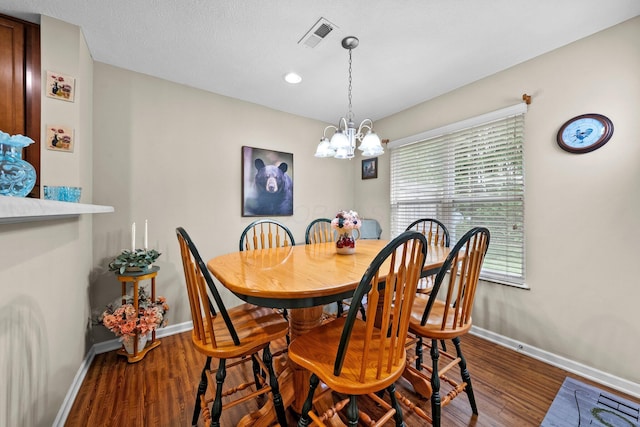 8438 Diversey Loop Unit 504, Blacklick, OH 43004 - dining space with wood finished floors, a chandelier, and recessed lighting