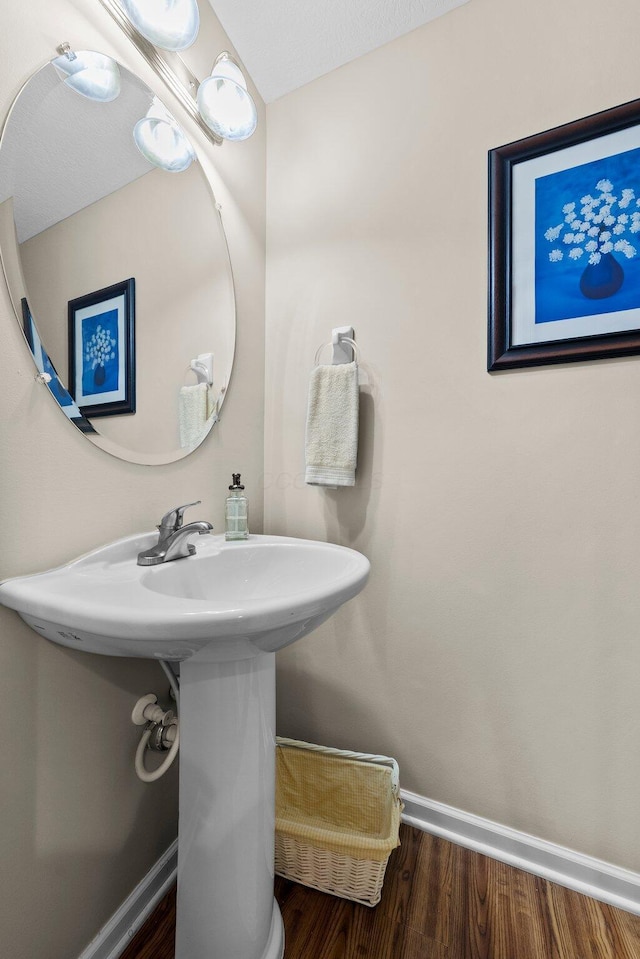 8438 Diversey Loop Unit 504, Blacklick, OH 43004 - bathroom featuring wood finished floors and baseboards