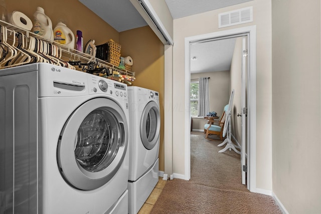 8438 Diversey Loop Unit 504, Blacklick, OH 43004 - laundry area with light colored carpet and washer and clothes dryer