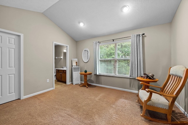 8438 Diversey Loop Unit 504, Blacklick, OH 43004 - sitting room featuring light colored carpet, vaulted ceiling, and recessed lighting