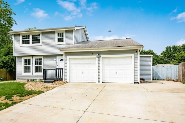 5350 Bittersweet Ct, Columbus, OH 43230 - view of front facade with an attached garage and concrete driveway