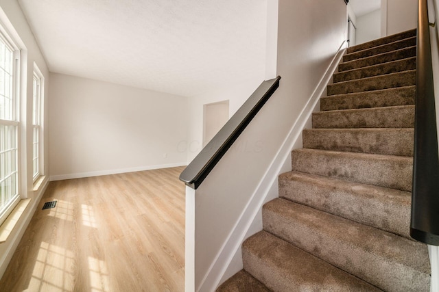 5350 Bittersweet Ct, Columbus, OH 43230 - stairway featuring wood finished floors and baseboards