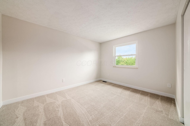 5350 Bittersweet Ct, Columbus, OH 43230 - unfurnished room with carpet flooring and a textured ceiling