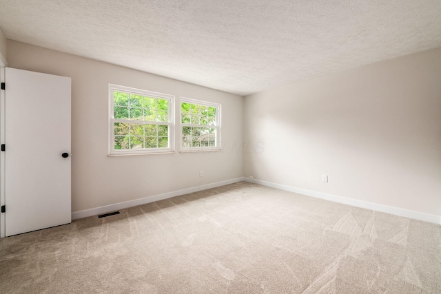 5350 Bittersweet Ct, Columbus, OH 43230 - carpeted spare room featuring a textured ceiling