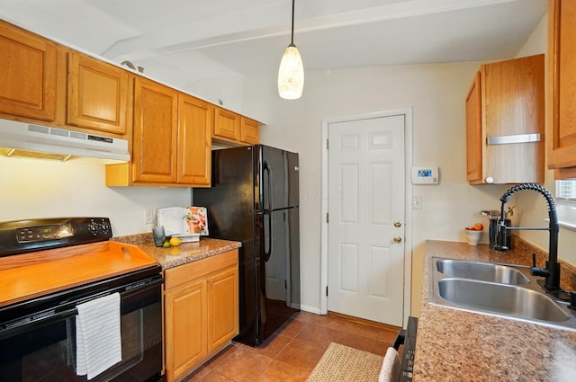 4860 Downing Dr, Columbus, OH 43232 - kitchen featuring black appliances, under cabinet range hood, light tile patterned floors, hanging light fixtures, and light countertops
