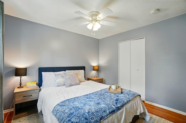 4860 Downing Dr, Columbus, OH 43232 - bedroom featuring wood finished floors, a closet, and a ceiling fan