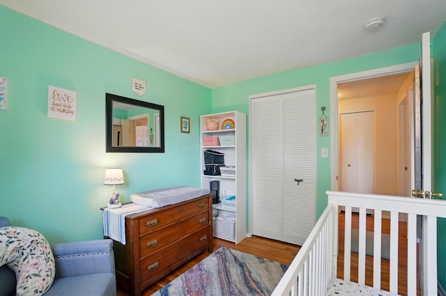 4860 Downing Dr, Columbus, OH 43232 - bedroom featuring a closet and wood finished floors