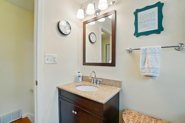 4860 Downing Dr, Columbus, OH 43232 - bathroom with vanity and a chandelier