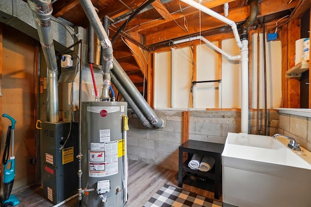 4860 Downing Dr, Columbus, OH 43232 - utility room featuring gas water heater