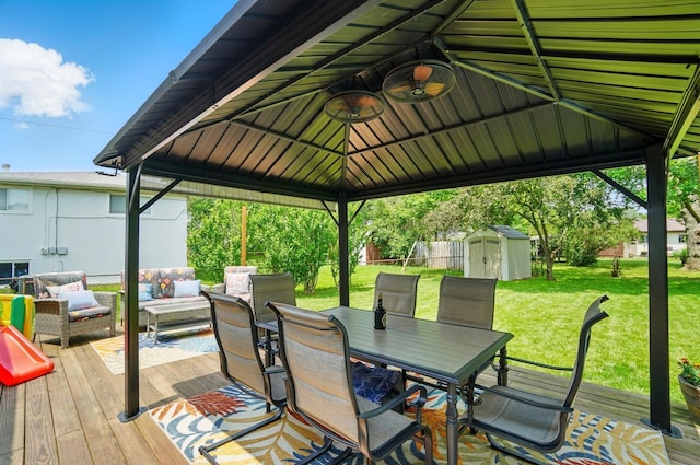 4860 Downing Dr, Columbus, OH 43232 - wooden terrace featuring a shed, outdoor dining space, outdoor lounge area, and a gazebo