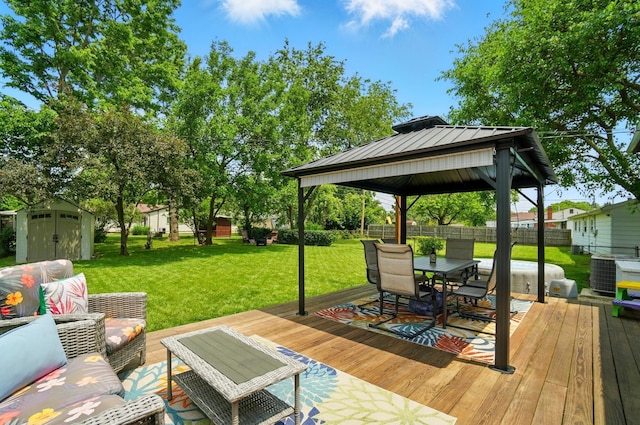 4860 Downing Dr, Columbus, OH 43232 - deck featuring a storage shed, a gazebo, and outdoor dining area