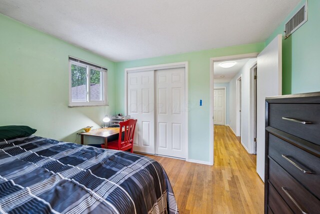 4750 Manitoba Ct, Columbus, OH 43229 - bedroom with light wood-style floors and a closet