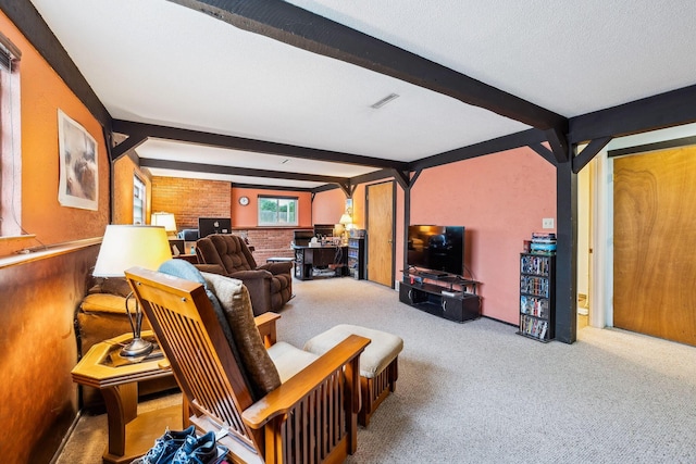 4750 Manitoba Ct, Columbus, OH 43229 - living room featuring beamed ceiling and carpet floors