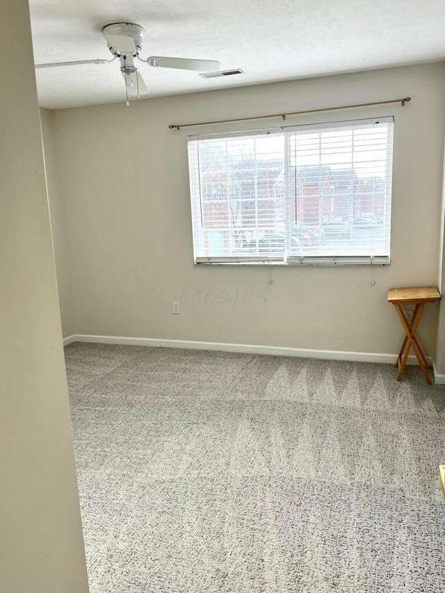 8061 Cranes Crossing Dr, Lewis Center, OH 43035 - unfurnished room featuring carpet floors, healthy amount of natural light, and ceiling fan