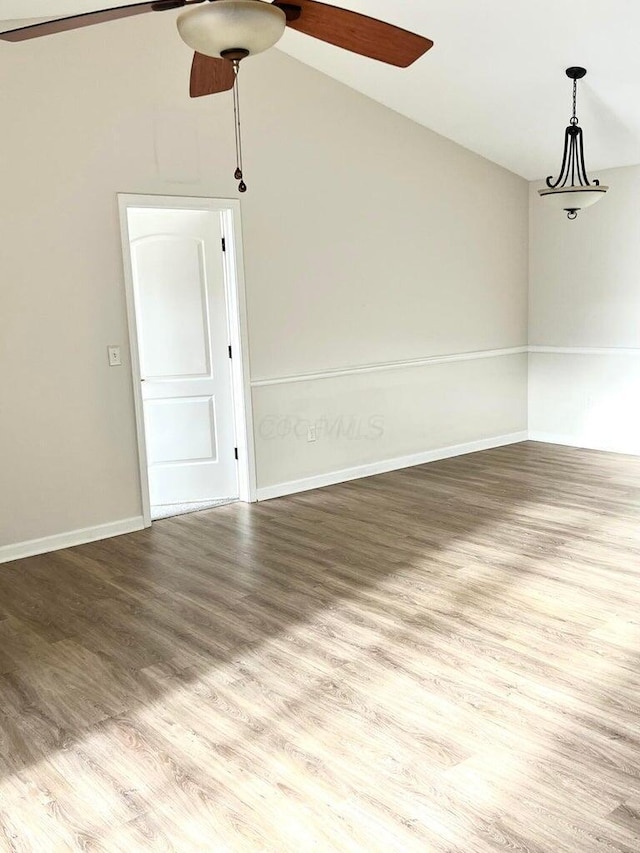 8061 Cranes Crossing Dr, Lewis Center, OH 43035 - unfurnished room with a ceiling fan, wood finished floors, and vaulted ceiling