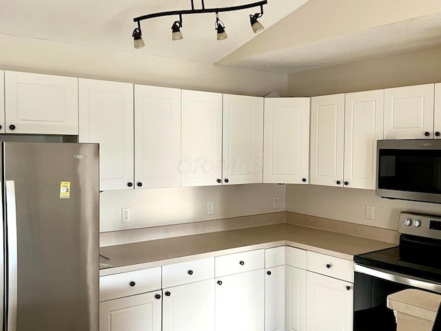 8061 Cranes Crossing Dr, Lewis Center, OH 43035 - kitchen featuring appliances with stainless steel finishes and white cabinets