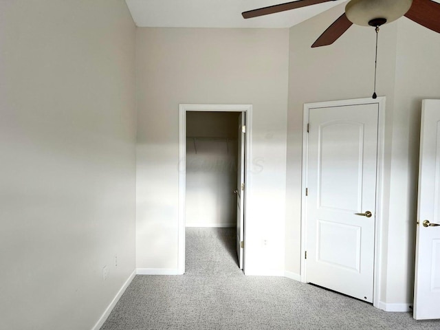 8061 Cranes Crossing Dr, Lewis Center, OH 43035 - unfurnished bedroom with carpet flooring, a spacious closet, a closet, and ceiling fan