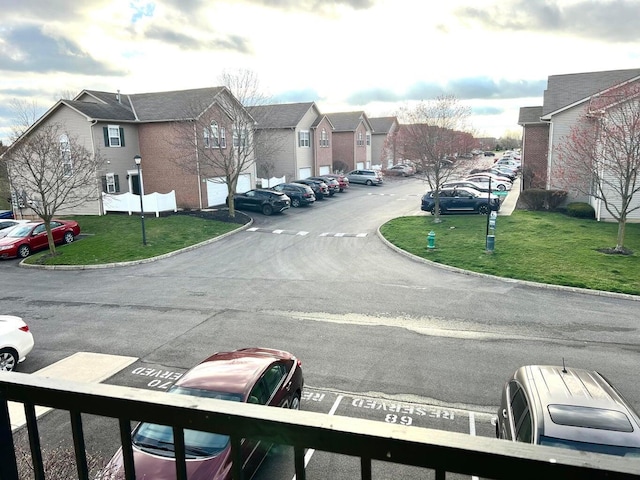 8061 Cranes Crossing Dr, Lewis Center, OH 43035 - view of asphalt road with a residential view and curbs