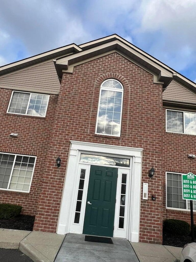 8061 Cranes Crossing Dr, Lewis Center, OH 43035 - view of front facade with brick siding