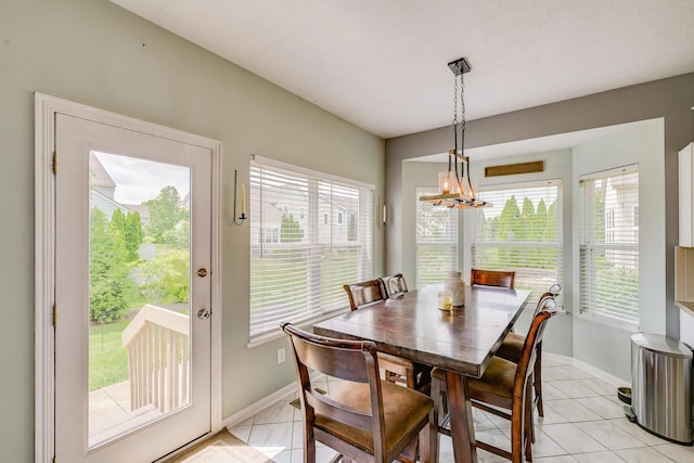 7029 Post Preserve Blvd, Dublin, OH 43016 - dining room with a chandelier and light tile patterned floors