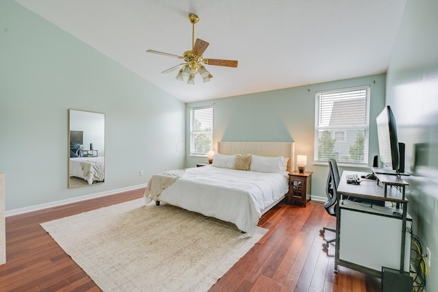 7029 Post Preserve Blvd, Dublin, OH 43016 - bedroom featuring dark wood-style floors, vaulted ceiling, a desk, and ceiling fan